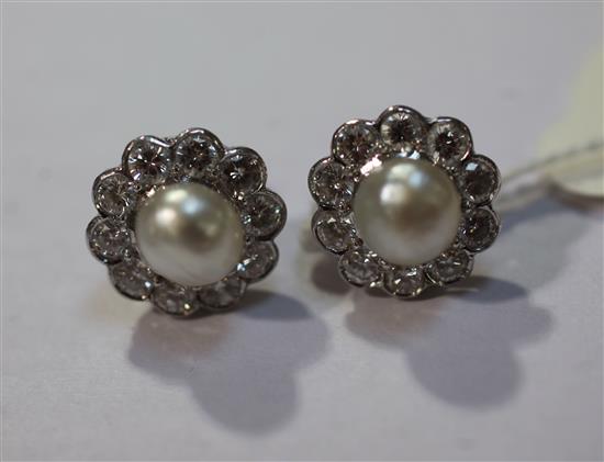 A pair of 20th century platinum, Oriental pearl and diamond cluster earrings, 13mm.